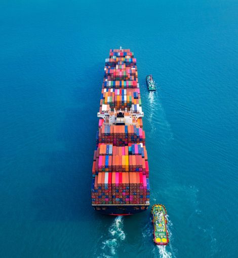 Aerial view of container cargo ship in sea.